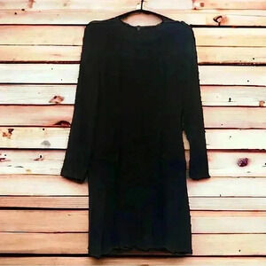 The Limited Size 4 Black Long-Sleeved Black Dress with Pleated Bottom.